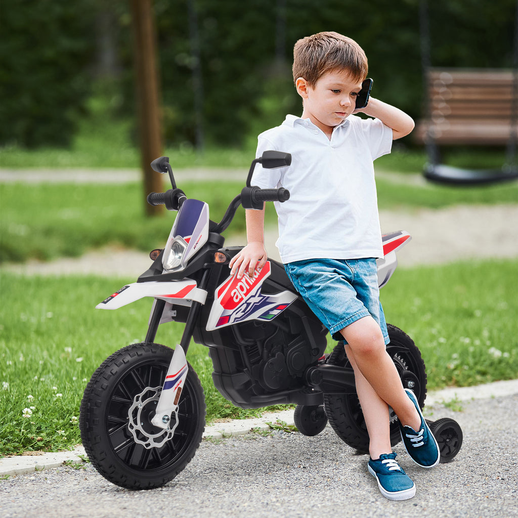 Moto électrique enfants sous licence Aprilia avec 2 moteurs 12V, roues d'entraînement, lumière LED, musique - blanc