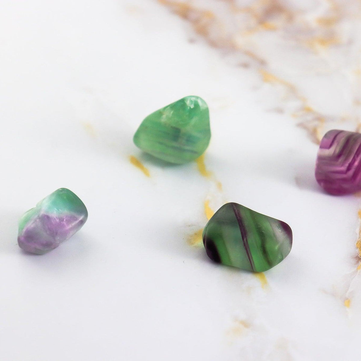 Multicolored Fluorite rolled stone